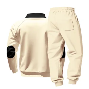 Back view of heavy men's beige fleece tracksuit set with black stand collar and elbow patches