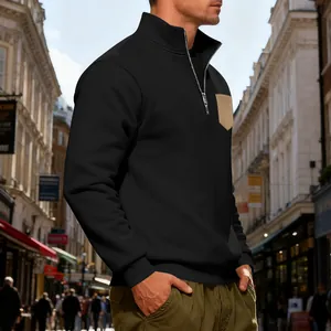 Men's heavyweight fleece half-zip sweatshirt in black with a tan chest pocket detail.