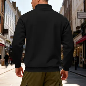 Back view of heavy black fleece-lined sweatshirt with stand collar in street setting