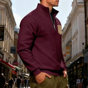 Side view of heavy fleece quarter-zip sweatshirt in burgundy with chest pocket
