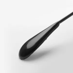 Detail of wide-shoulder non-marking clothes hanger with anti-slip black matte finish.