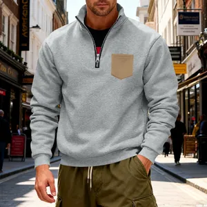 American style grey heavy fleece quarter-zip sweatshirt for men with a tan chest pocket