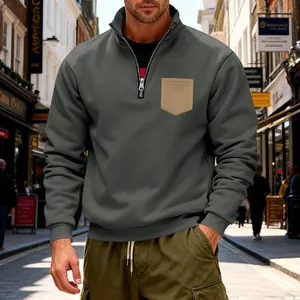 Close-up of men's heavy fleece quarter-zip sweatshirt with contrast chest pocket