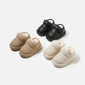 Warm winter snow boots for toddlers in black, tan and beige with quilted design.