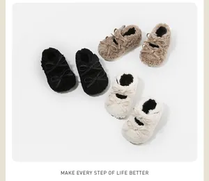 Zapatos cálidos de invierno de felpa para bebés con detalles de lazos dobles suaves
