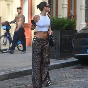 Stylish leopard print high waist wide-leg trousers for a trendy street fashion look.
