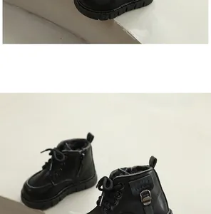 Detailed view of black winter children's Martin boots with plush lining and side zipper.