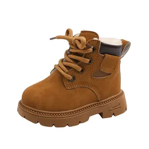 High-quality detail view of warm brown kids' Martin boots with soft white plush lining