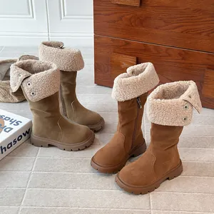 Warm fleece-lined girl's high boots with fold-over shearling cuffs in brown
