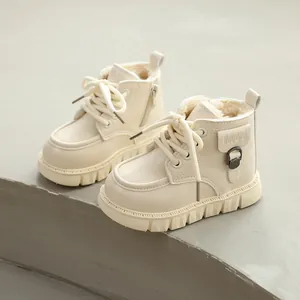 Cozy beige fleece-lined winter Martin boots for toddlers with a soft non-slip sole.