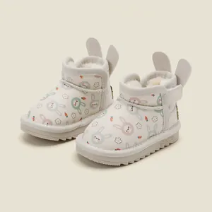 Adorable winter baby snow boots featuring cute bunny ears and cartoon rabbit prints