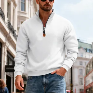 Detail of men's white half-zip sweatshirt with stand collar and decorative logo patch