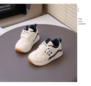 Close-up detail of toddler girls sports shoes featuring a cute panda and velcro strap