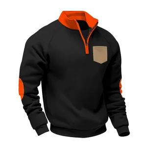 Detail view of men's quarter-zip fleece sweatshirt with contrast pocket and elbow patches