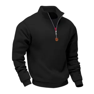 Detailed view of the 1/4 zipper and collar on this men's black fleece sweatshirt