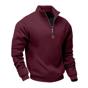 Close-up detail of men's burgundy heavy fleece sweatshirt with stand-collar zipper