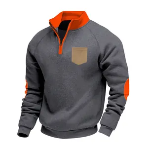 Detail view of men's heavy fleece half-zip pullover with orange collar and elbow patches.