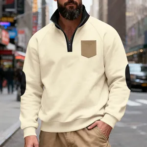 Detail view of men's cream heavyweight fleece sweatshirt with stand collar and pocket