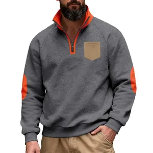 Men's heavy fleece quarter-zip sweatshirt with orange elbow patches and tan chest pocket.
