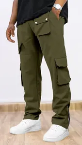Close-up detail of men's olive green cargo pants with multi-pockets and zip hem