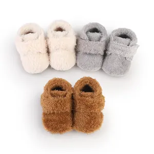 Collection of soft plush baby walking shoes in cream, grey and brown for infants 0-1 year