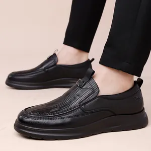 Premium black genuine leather men's loafers with a thick durable sole and slip-on design