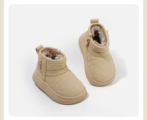 Detail view of quilted beige toddler winter boots showing thick sole and cozy fleece lining