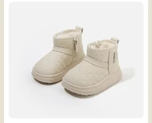 Detailed view of cream quilted toddler winter boots with cozy faux fur lining for warmth