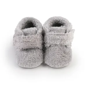 Soft grey plush baby walking shoes for infants aged 0-1 year with hook and loop closure