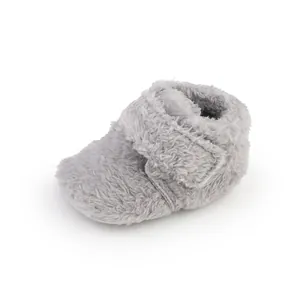 Detailed view of soft grey plush infant baby pre-walker booties for 0-1 year olds