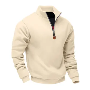 Detail of men's beige heavy fleece sweatshirt featuring quarter-zip stand collar