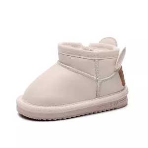 Warm beige toddler winter snow boots featuring cute ear design and plush lining for baby