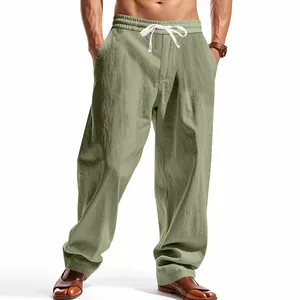 Pantalon ample en lin vert olive pour homme avec jambe large et cordon de serrage