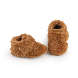 Detailed view of brown plush baby walking shoes for infants aged 0 to 1 year old