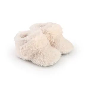 Soft fuzzy cream baby walking shoes with plush faux fur texture for infants 0-1 year