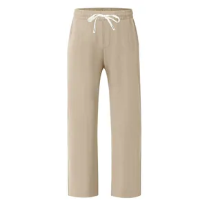 Vue de face du pantalon en lin ample et respirant pour hommes avec cordon blanc