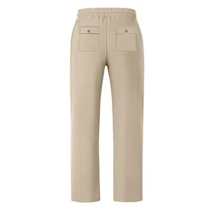 Vue arrière de pantalon large décontracté en lin beige pour hommes avec poches boutonnées