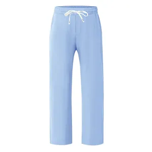 Vue de face du pantalon large décontracté en lin pour homme bleu clair avec cordon