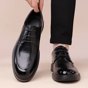 Classic men's black leather Derby dress shoes featuring elegant crocodile pattern