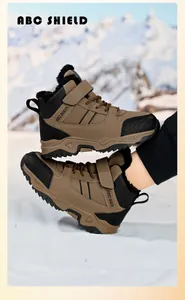 Detail of durable boys' winter snow boots with warm fur lining and rugged tread