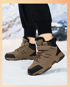 Warm children's fur-lined snow boots for boys, shown outdoors in a snowy scene.