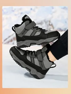 Detailed view of boys' winter snow boots with warm fleece lining and sturdy soles