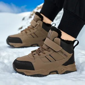 Durable brown boys snow boots with warm faux fur lining for winter outdoor activities