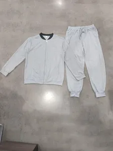 Full view of light gray men's loose casual tracksuit with zipper jacket and joggers