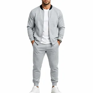 Detailed view of a men's light grey casual tracksuit with a zip-up baseball collar jacket.