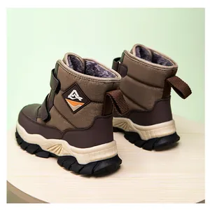 Sturdy boys' winter snow boots with warm fleece lining and non-slip rubber outsoles.