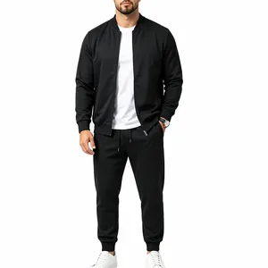 Professional men's minimalist black tracksuit featuring baseball collar jacket and pants
