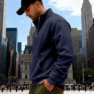 Sudadera de forro polar azul marino para hombre con media cremallera y bolsillo.