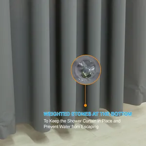Detailed view of weighted stones at the bottom of the waterproof grey shower curtain