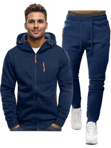 Close-up view of navy blue men's casual hooded tracksuit with distinctive orange zipper details